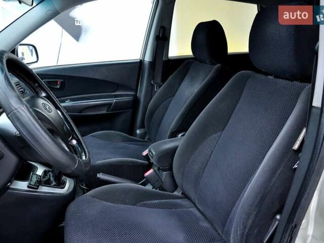 Бежевый Хендай Туксон, объемом двигателя 1.98 л и пробегом 257 тыс. км за 6500 $, фото 16 на Automoto.ua