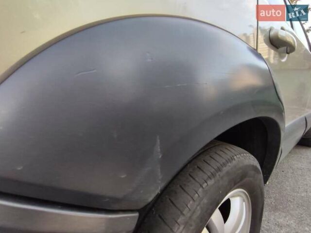 Бежевый Хендай Туксон, объемом двигателя 1.98 л и пробегом 264 тыс. км за 7500 $, фото 13 на Automoto.ua