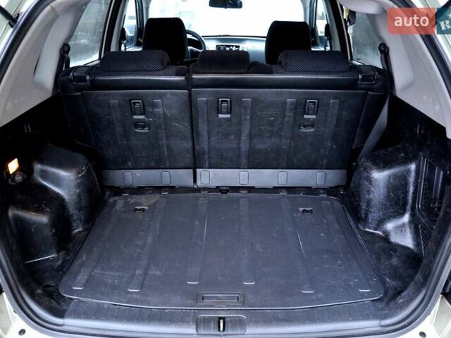 Бежевый Хендай Туксон, объемом двигателя 1.98 л и пробегом 257 тыс. км за 6500 $, фото 19 на Automoto.ua