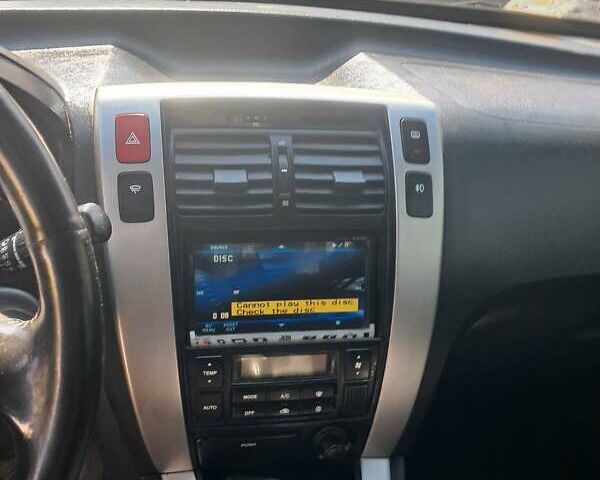 Бежевий Хендай Туксон, об'ємом двигуна 1.98 л та пробігом 202 тис. км за 7300 $, фото 4 на Automoto.ua