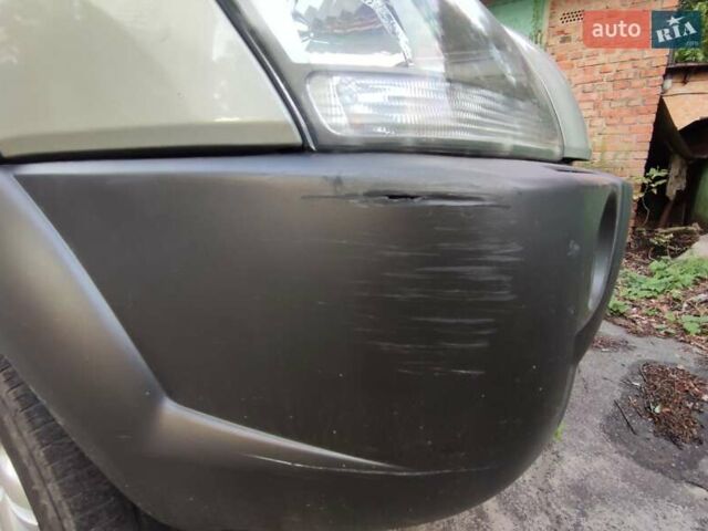 Бежевый Хендай Туксон, объемом двигателя 1.98 л и пробегом 264 тыс. км за 7500 $, фото 14 на Automoto.ua