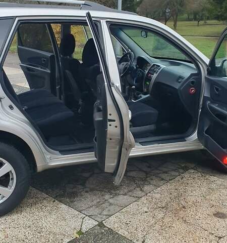 Бежевый Хендай Туксон, объемом двигателя 2 л и пробегом 254 тыс. км за 7700 $, фото 16 на Automoto.ua