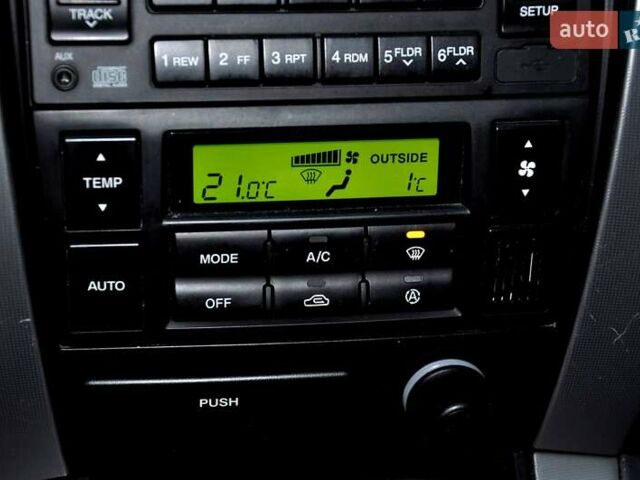 Бежевый Хендай Туксон, объемом двигателя 1.98 л и пробегом 257 тыс. км за 6500 $, фото 28 на Automoto.ua