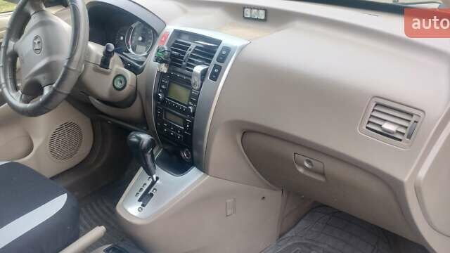 Бежевий Хендай Туксон, об'ємом двигуна 1.98 л та пробігом 292 тис. км за 9000 $, фото 9 на Automoto.ua