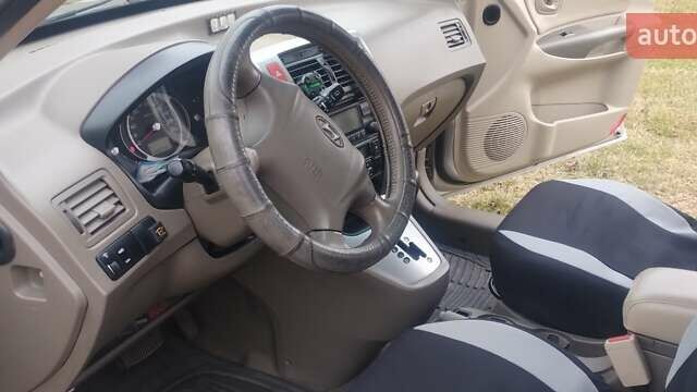 Бежевий Хендай Туксон, об'ємом двигуна 1.98 л та пробігом 292 тис. км за 9000 $, фото 21 на Automoto.ua