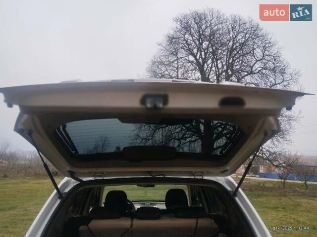 Бежевий Хендай Туксон, об'ємом двигуна 1.98 л та пробігом 292 тис. км за 9000 $, фото 5 на Automoto.ua