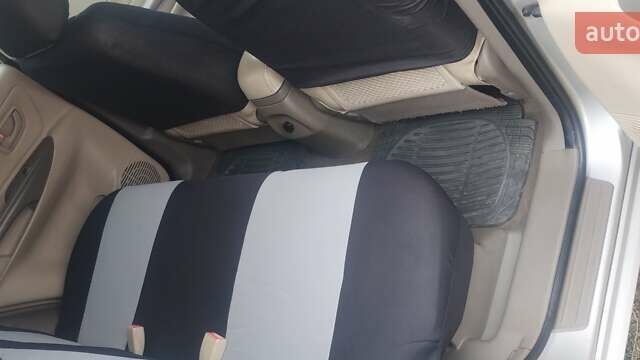 Бежевий Хендай Туксон, об'ємом двигуна 1.98 л та пробігом 292 тис. км за 9000 $, фото 7 на Automoto.ua