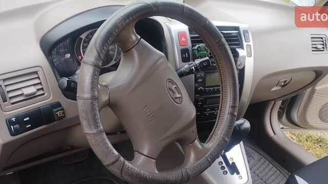 Бежевий Хендай Туксон, об'ємом двигуна 1.98 л та пробігом 292 тис. км за 9000 $, фото 19 на Automoto.ua