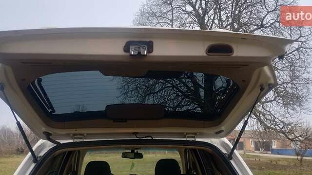 Бежевий Хендай Туксон, об'ємом двигуна 1.98 л та пробігом 292 тис. км за 9000 $, фото 11 на Automoto.ua