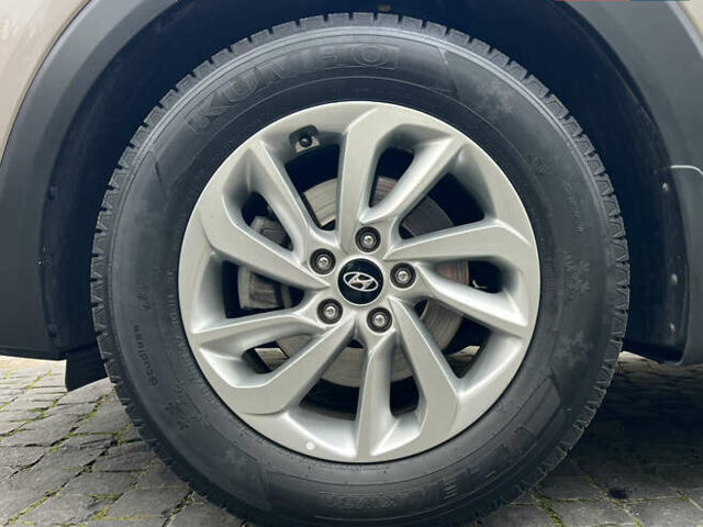 Бежевый Хендай Туксон, объемом двигателя 2 л и пробегом 50 тыс. км за 19500 $, фото 7 на Automoto.ua