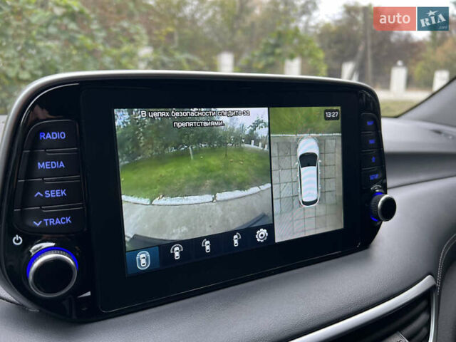 Бежевий Хендай Туксон, об'ємом двигуна 2 л та пробігом 125 тис. км за 19999 $, фото 4 на Automoto.ua