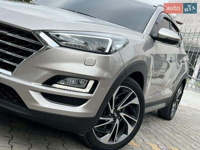 Бежевий Хендай Туксон, об'ємом двигуна 2 л та пробігом 125 тис. км за 19999 $, фото 59 на Automoto.ua