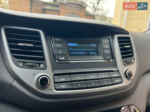 Бежевый Хендай Туксон, объемом двигателя 2 л и пробегом 50 тыс. км за 19500 $, фото 20 на Automoto.ua