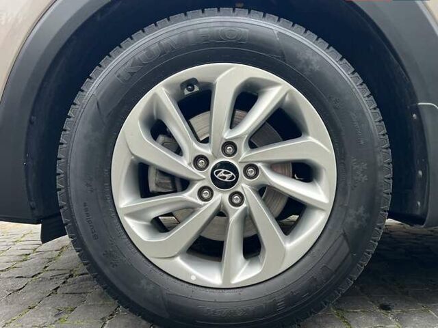 Бежевий Хендай Туксон, об'ємом двигуна 2 л та пробігом 50 тис. км за 19700 $, фото 7 на Automoto.ua