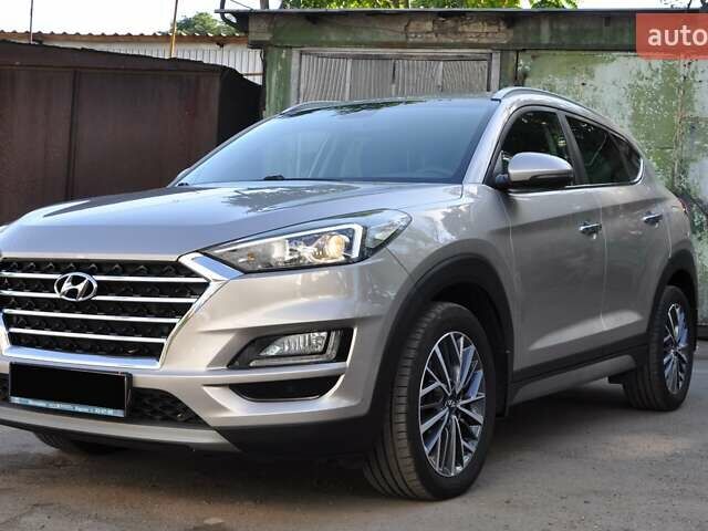 Бежевый Хендай Туксон, объемом двигателя 2 л и пробегом 58 тыс. км за 25000 $, фото 1 на Automoto.ua