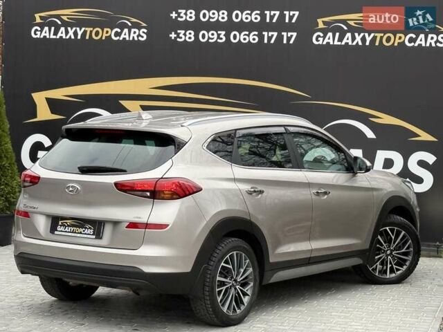 Бежевый Хендай Туксон, объемом двигателя 2 л и пробегом 92 тыс. км за 20900 $, фото 22 на Automoto.ua