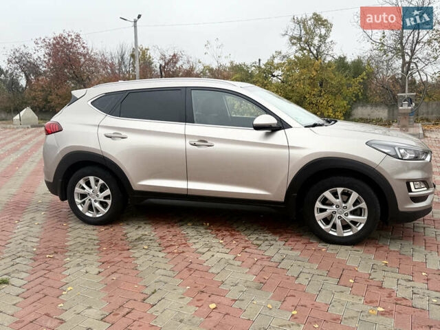 Бежевий Хендай Туксон, об'ємом двигуна 2 л та пробігом 106 тис. км за 20900 $, фото 2 на Automoto.ua