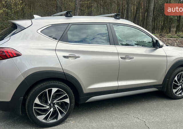 Бежевый Хендай Туксон, объемом двигателя 2 л и пробегом 98 тыс. км за 26700 $, фото 8 на Automoto.ua