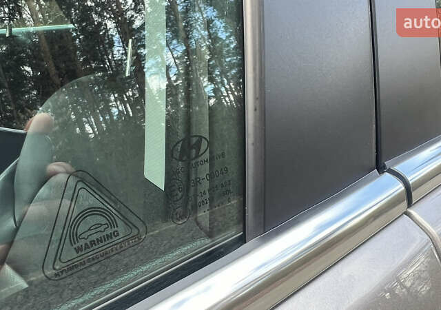 Бежевый Хендай Туксон, объемом двигателя 2 л и пробегом 98 тыс. км за 26700 $, фото 18 на Automoto.ua