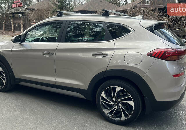 Бежевый Хендай Туксон, объемом двигателя 2 л и пробегом 98 тыс. км за 26700 $, фото 11 на Automoto.ua