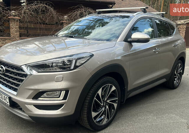 Бежевый Хендай Туксон, объемом двигателя 2 л и пробегом 98 тыс. км за 26700 $, фото 1 на Automoto.ua