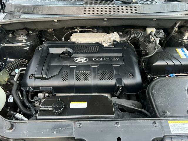 Черный Хендай Туксон, объемом двигателя 2 л и пробегом 276 тыс. км за 6950 $, фото 3 на Automoto.ua