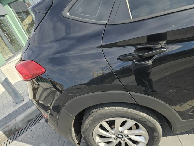 Чорний Хендай Туксон, об'ємом двигуна 2 л та пробігом 187 тис. км за 17000 $, фото 4 на Automoto.ua