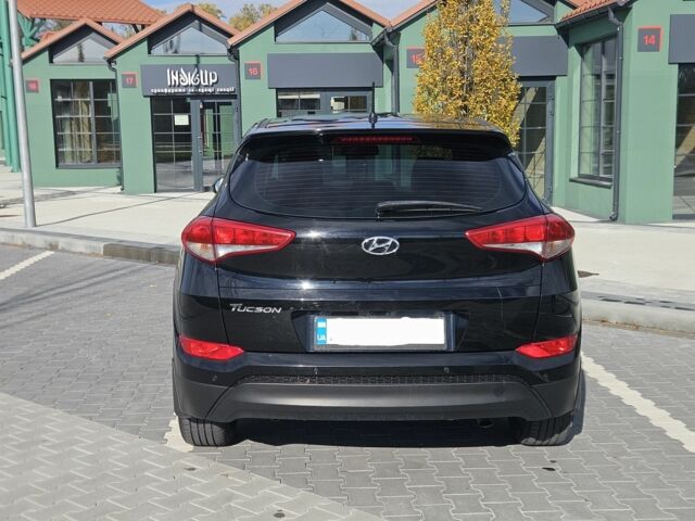 Чорний Хендай Туксон, об'ємом двигуна 2 л та пробігом 187 тис. км за 17000 $, фото 9 на Automoto.ua