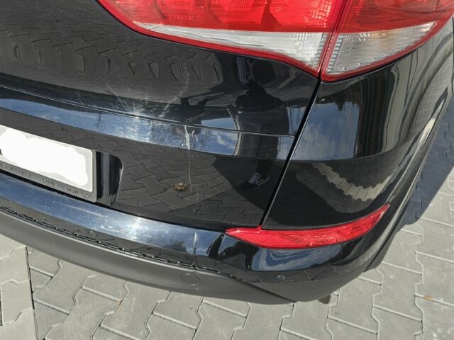 Чорний Хендай Туксон, об'ємом двигуна 2 л та пробігом 187 тис. км за 17000 $, фото 12 на Automoto.ua