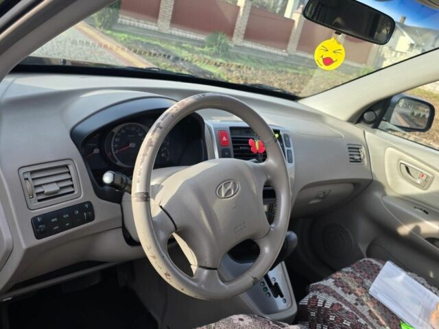 Черный Хендай Туксон, объемом двигателя 2 л и пробегом 217 тыс. км за 7195 $, фото 10 на Automoto.ua