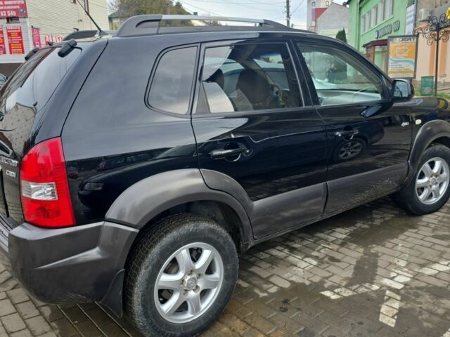 Черный Хендай Туксон, объемом двигателя 2 л и пробегом 217 тыс. км за 7195 $, фото 3 на Automoto.ua