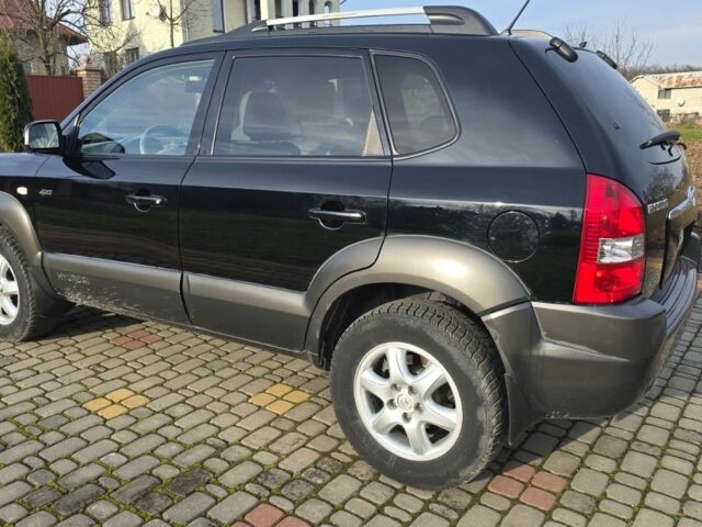 Черный Хендай Туксон, объемом двигателя 2 л и пробегом 217 тыс. км за 7195 $, фото 8 на Automoto.ua