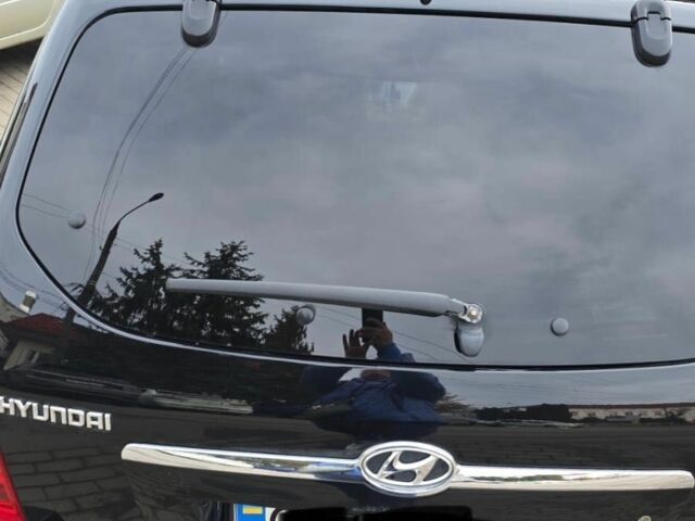 Черный Хендай Туксон, объемом двигателя 2 л и пробегом 217 тыс. км за 7195 $, фото 1 на Automoto.ua