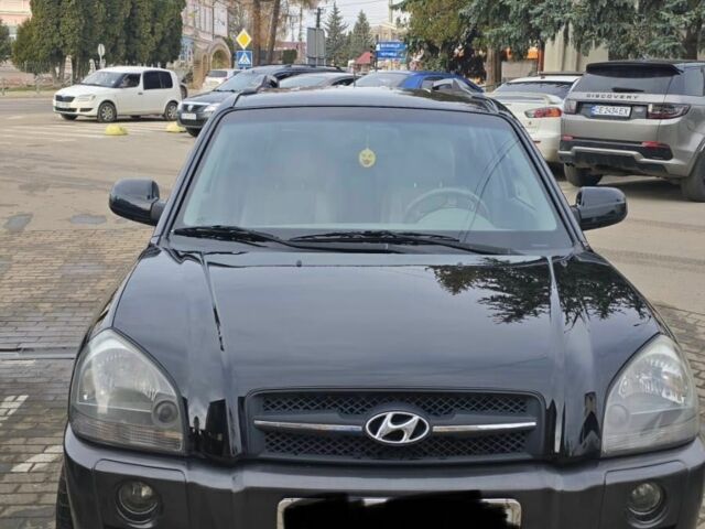 Черный Хендай Туксон, объемом двигателя 2 л и пробегом 217 тыс. км за 7195 $, фото 5 на Automoto.ua