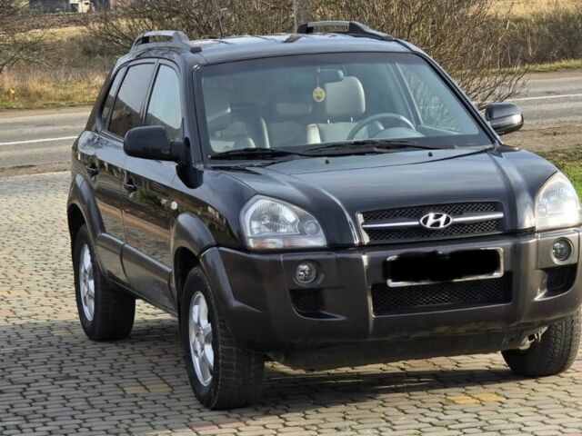 Черный Хендай Туксон, объемом двигателя 2 л и пробегом 217 тыс. км за 7195 $, фото 7 на Automoto.ua