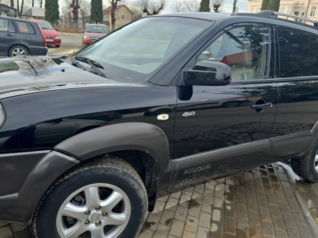 Черный Хендай Туксон, объемом двигателя 2 л и пробегом 217 тыс. км за 7195 $, фото 6 на Automoto.ua