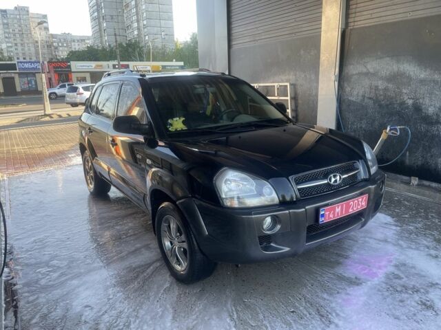 Черный Хендай Туксон, объемом двигателя 2 л и пробегом 240 тыс. км за 5400 $, фото 1 на Automoto.ua