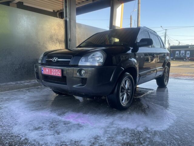 Черный Хендай Туксон, объемом двигателя 2 л и пробегом 240 тыс. км за 5400 $, фото 3 на Automoto.ua