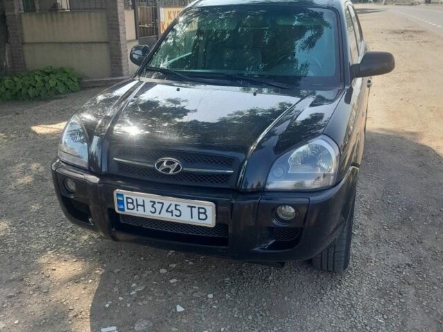 Черный Хендай Туксон, объемом двигателя 2 л и пробегом 500 тыс. км за 6500 $, фото 1 на Automoto.ua