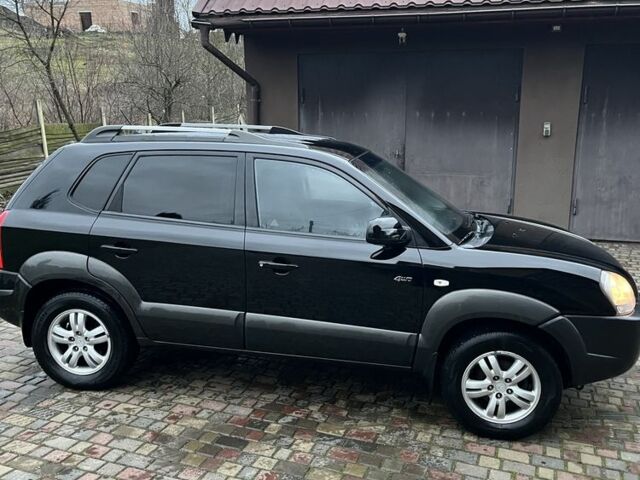 Чорний Хендай Туксон, об'ємом двигуна 2 л та пробігом 175 тис. км за 8200 $, фото 6 на Automoto.ua