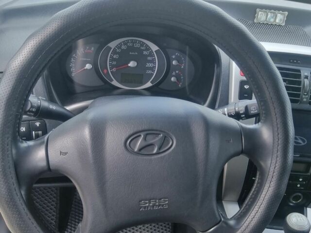 Чорний Хендай Туксон, об'ємом двигуна 2 л та пробігом 257 тис. км за 8900 $, фото 6 на Automoto.ua