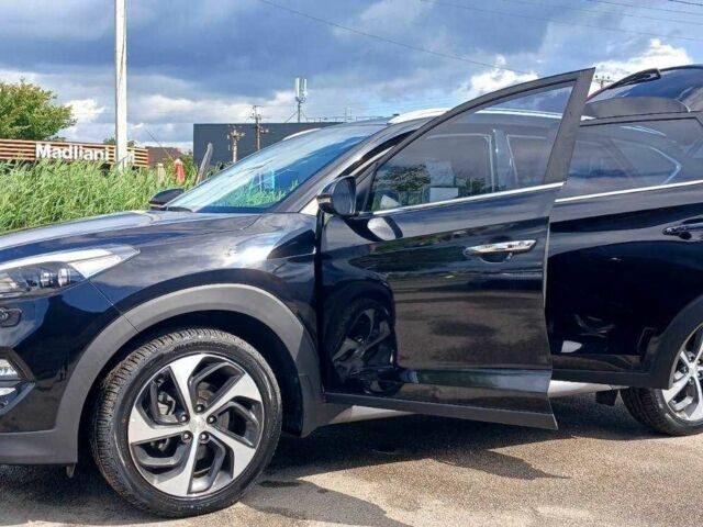 Черный Хендай Туксон, объемом двигателя 2 л и пробегом 3 тыс. км за 39000 $, фото 11 на Automoto.ua