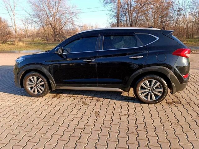 Черный Хендай Туксон, объемом двигателя 2 л и пробегом 148 тыс. км за 17800 $, фото 1 на Automoto.ua