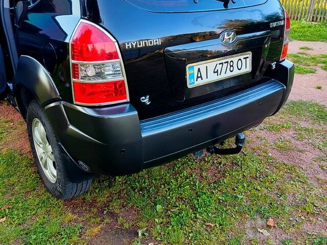 Чорний Хендай Туксон, об'ємом двигуна 2 л та пробігом 268 тис. км за 8000 $, фото 3 на Automoto.ua