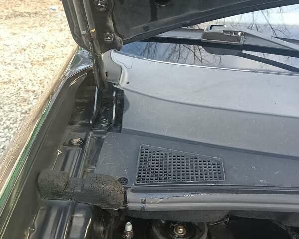 Черный Хендай Туксон, объемом двигателя 2 л и пробегом 236 тыс. км за 6000 $, фото 28 на Automoto.ua