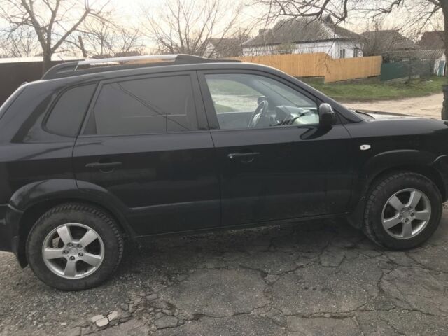 Чорний Хендай Туксон, об'ємом двигуна 2 л та пробігом 270 тис. км за 5850 $, фото 7 на Automoto.ua