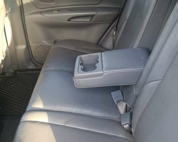 Черный Хендай Туксон, объемом двигателя 2 л и пробегом 236 тыс. км за 6000 $, фото 12 на Automoto.ua