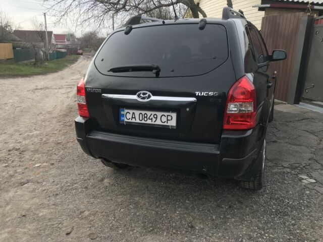 Чорний Хендай Туксон, об'ємом двигуна 2 л та пробігом 270 тис. км за 5850 $, фото 5 на Automoto.ua