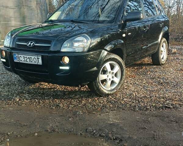 Черный Хендай Туксон, объемом двигателя 2 л и пробегом 236 тыс. км за 6000 $, фото 8 на Automoto.ua