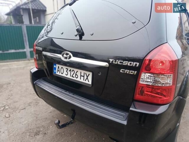 Черный Хендай Туксон, объемом двигателя 1.99 л и пробегом 302 тыс. км за 6300 $, фото 17 на Automoto.ua